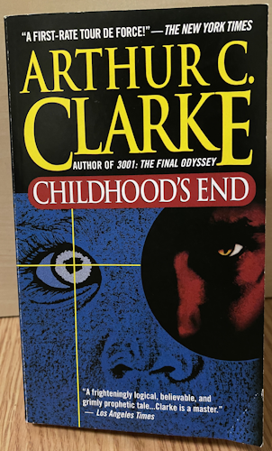 A copy of Childhood's End. It shows a child's face in blue, one eye obscured by a circle that has a demonic red eye in it.